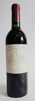 Lot 64 - Chateau Latour 1984, Pauillac U: very top shoulder/into neck, soiled label