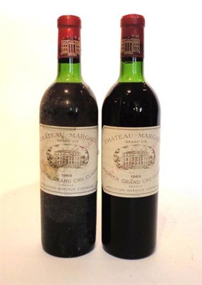 Lot 69 - Chaetau Margaux 1969, Margaux (x2) (two bottles) U: upper/top shoulder, one soiled label