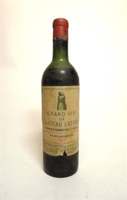 Lot 77 - Chateau Latour 1975, Pauillac U: upper/mid shoulder, soiled and torn label and capsule