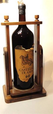 Lot 180 - Castello di Ama Chianti Classico  1983, 5 litre bottle in a wooden cradle U: into neck, torn label