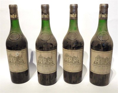 Lot 1015 - Chateau Haut Brion 1969, Graves (x4) (four bottles) U: 4.5cm, 5.5cm, 5cm, 5cm