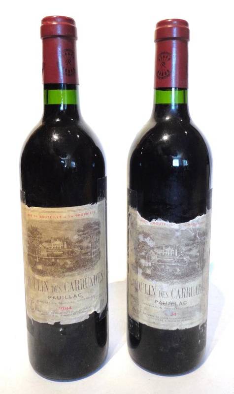 Lot 1037 - Moulin des Carraudes 1984, Pauillac (x2) (two bottles) U: into neck, both bottles with perished and