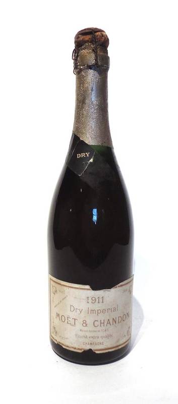 Lot 1155 - Moet & Chandon 1911, vintage champagne U: 2.5cm, nicks to label, foil to cork missing