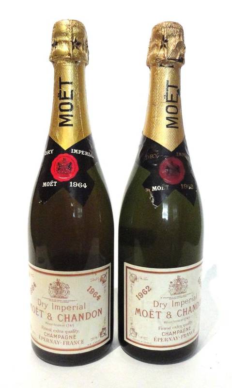 Lot 1163 - Moet & Chandon Dry Imperial 1964 & 1962, vintage champagne (two bottles) U: 1.5cm and 2cm inverted