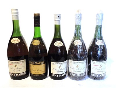 Lot 1233 - Remy Martin VSOP Cognac Circa 1960/1970, four with white labels and capsules, the other with a gold