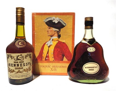 Lot 1234 - Hennessy X.O. Cognac, old style bottle with orange and red card case, 24 fl ozs, 70°; Hennessy...