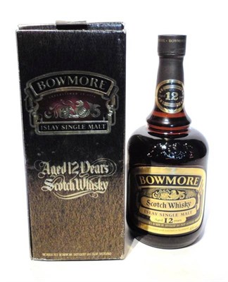 Lot 1271 - Bowmore (Morrison's) 12 Year Old, old style gold label on a brown glass dumpy style bottle,...