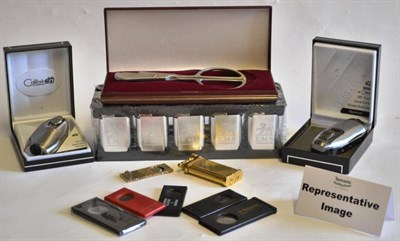 Lot 1192 - A Large Quantity of Assorted Cigar Smoking Accessories Including; various lighters, turbo lighters