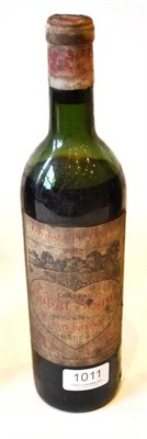 Lot 1011 - Chateau Calon Segur 1958, St Estephe U: mid shoulder, soiled label