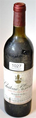 Lot 1027 - Chateau Giscours 1982, Margaux U: upper shoulder, soiled label