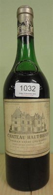 Lot 1032 - Chateau Haut Brion 1969, Graves U: 6cm from foil, very fragile sunken cork, caveat emptor