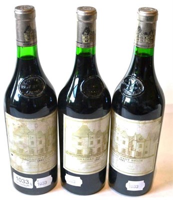 Lot 1033 - Chateau Haut Brion 1981, Graves (x3) (three bottles) U: 1cm, 1cm, 1.5cm, faded labels, see...