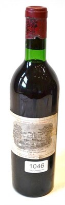 Lot 1046 - Chateau Lafite Rothschild 1970, Pauillac U: top shoulder, small tear to label and nick to capsule