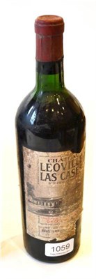 Lot 1059 - Chateau Leoville Las Cases 1957, St Julien U: upper shoulder, soiled and torn label