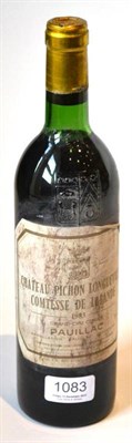 Lot 1083 - Chateau Pichon Longueville Comtesse de Lalande 1983, Pauillac U: top shoulder, soiled label