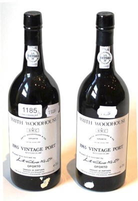 Lot 1185 - Smith Woodhouse 1985, vintage port (x2) U: into neck