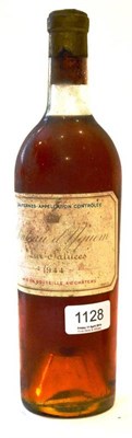 Lot 1128 - Chateau d'Yquem 1944, Sauternes U: top shoulder, trimmed capsule, partially soiled label