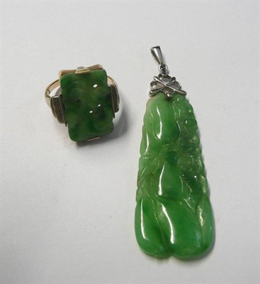 Lot 1 - A Carved Jade Pendant, of obelisk form with an entwined pendant bale, measures 1.5cm by 5.4cm,...