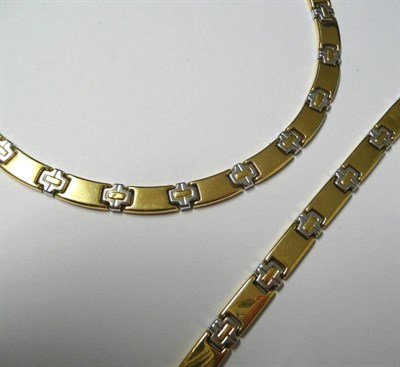 Lot 4 - A Middle Eastern Necklace and Bracelet Set, polished yellow bar links alternate with white...