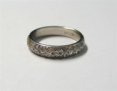 Lot 7 - A Diamond Ring, eight-cut diamonds in two rows, pavé set to a plain polished shank, total...