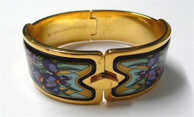 Lot 25 - A Enamelled Bangle, by Frey Wille, the hinged broad bangle depicting iris flowers, stamped...