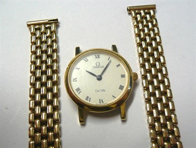 Lot 56 - A Lady's 18ct Gold Wristwatch and 9ct Gold Bracelet, signed Omega, Model: DeVille, circa 1990,...