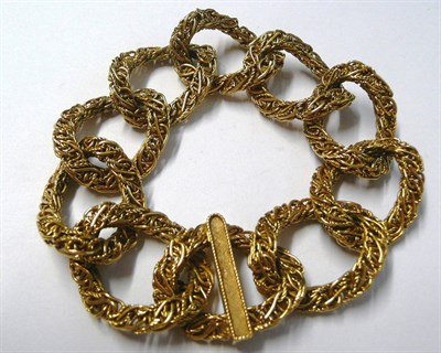 Lot 58 - A 18 Carat Gold Fancy Link Bracelet, fancy linked large hoops entwine, length 21cm