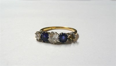 Lot 59 - An Early 20th Century Diamond and Sapphire Five Stone Ring, the old cut stones alternate, in...