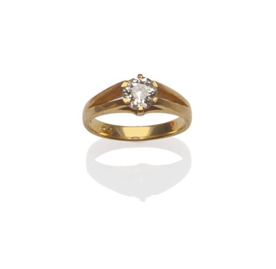 Lot 70 - A Diamond Solitaire Ring, the old cut diamond within a yellow claw forked shoulder setting, on...