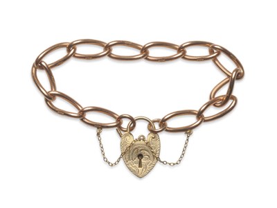 Lot 76 - A Rose Gold Curb Bracelet, with 9 Carat Gold Engraved Padlock, the open curb links stamped...