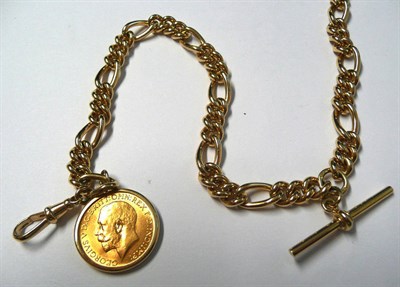 Lot 81 - A 9 Carat Gold Albert Chain, hung with a 1914 Sovereign, the figaro link chain, with a t-bar, a...