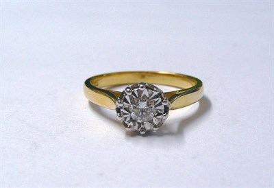 Lot 88 - An 18 Carat Gold Diamond Solitaire Ring, a round brilliant cut diamond in a white illusion setting