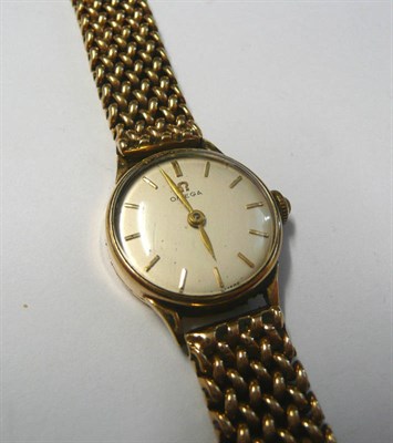 Lot 90 - A 9ct Gold Lady's Wristwatch, signed Omega, 1950, (calibre 241) 15-jewel lever movement...