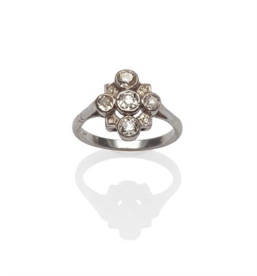 Lot 97 - A Diamond Cluster Ring, circa 1920, five old brilliant cut diamonds arranged in a quatrefoil...