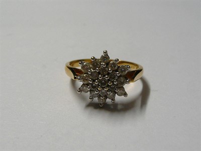 Lot 112 - An 18 Carat Gold Diamond Cluster Ring, round brilliant cut diamonds in white claw settings, to...