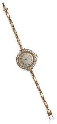 Lot 133 - A 9ct Gold Diamond Set Lady's Wristwatch, 1935, 15-jewel lever movement silvered dial with...