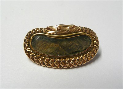 Lot 136 - A Late George III Snake Memorial Brooch, the textured snake encloses a locket containing...