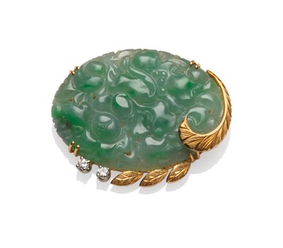 Lot 151 - A Jade and Diamond Brooch, by Birks, the oval carved and pierced jade within a leaf motif...