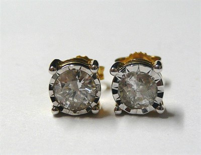 Lot 163 - A Pair of 18 Carat Gold Diamond Solitaire Stud earrings, the round brilliant cut diamonds...