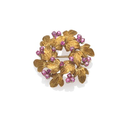 Lot 181 - A Ruby Set Leaf Hoop Brooch, of yellow textured leaves, with ruby details, measures 3.4cm in...