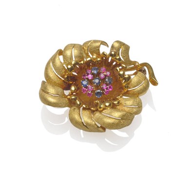 Lot 182 - An 18 Carat Gold Flower Brooch, a cluster of sapphires and rubies centrally within a frame of...