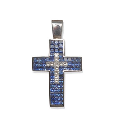 Lot 191 - A Diamond and Sapphire Cross Pendant, the princess cut stones pavé set throughout, measures...