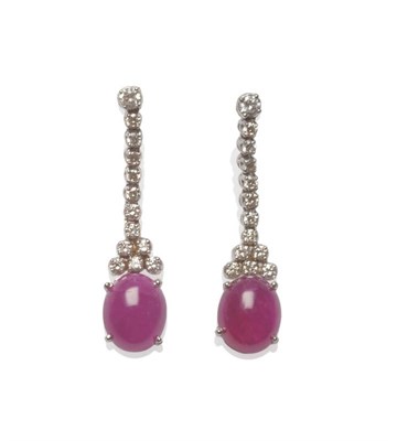 Lot 193 - A Pair of 18 Carat White Gold Ruby and Diamond Drop Earrings, a row of round brilliant cut diamonds