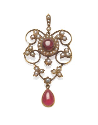 Lot 212 - An Early 20th Century Garnet and Seed Pearl Pendant, a round cabochon garnet within a border...