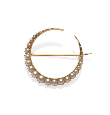 Lot 213 - A Late Victorian Crescent Brooch, the almost full circle set with graduated split pearls,...