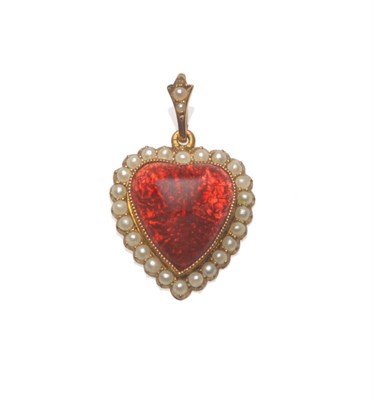 Lot 216 - An Early 20th Century Heart Pendant, the domed centre enamelled in red, within a border of seed...