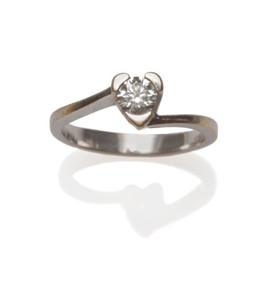 Lot 7 - A Diamond Solitaire Ring, the round brilliant cut diamond in a white three claw setting, to...