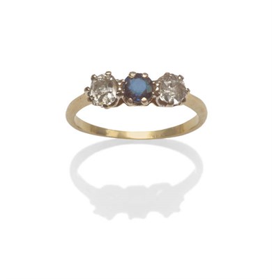 Lot 27 - A Sapphire and Diamond Three Stone Ring, the old cut stones in white claw settings, to a...