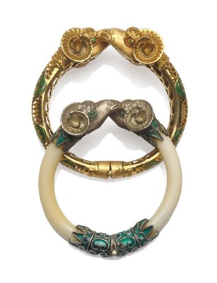 Lot 31 - A Ram's Head Bangle, the hollow and pierced bangle enamelled with green panels and hinged, to a...