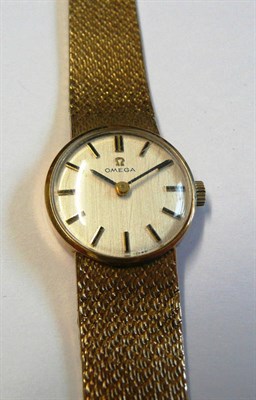 Lot 35 - A Lady's 9ct Gold Wristwatch, signed Omega, 1975, lever movement numbered 35929953, silvered...